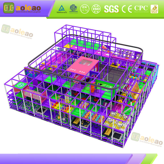 large indoor adventure structure with connected play routes