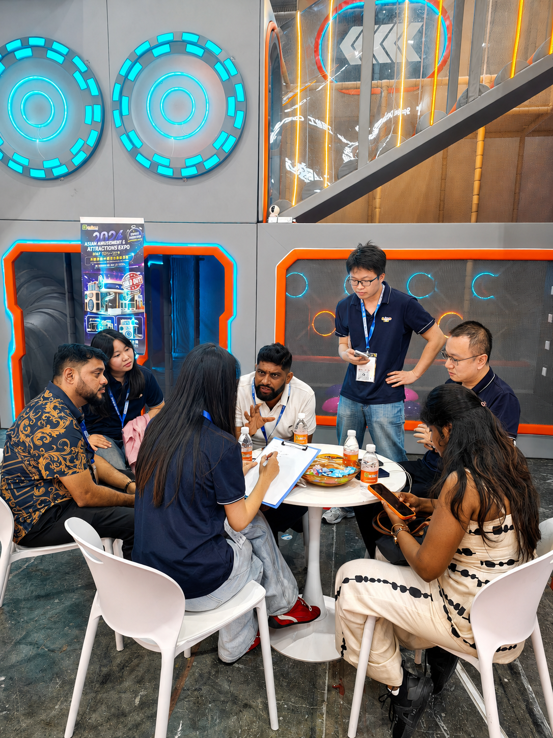 Indoor playground project discussion with exhibition visitors
